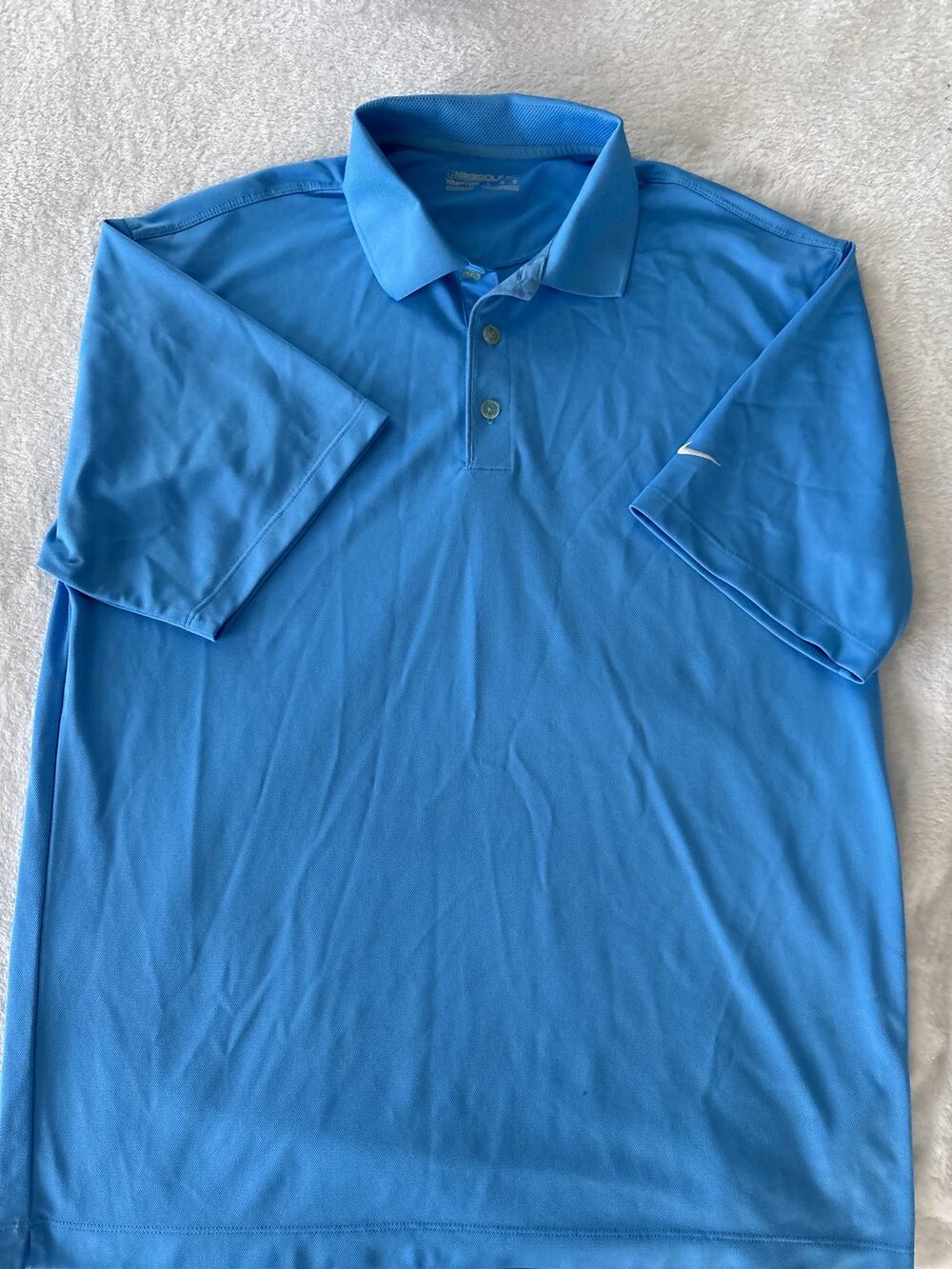 Nike golf fit dry polo shirt. Size large. Blue.